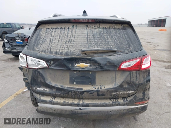 2021 Chevrolet Equinox Premier z VIN 2GNAXXEV2M6118116, wystawiony jako IAAI lot #41185151 z przebiegiem 91 837 mil mil oraz . Historia ofert i sprzedaży dostępna na DreamBid. Obrazek 16.