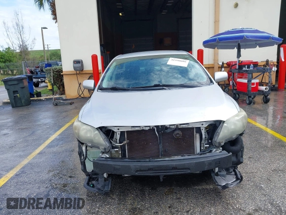2013 Toyota Corolla L with VIN 5YFBU4EE7DP209207, listed as a IAAI auction lot 41990086 with 168,269 mi miles. Bid and sale history available at carsss.com. Image 12.