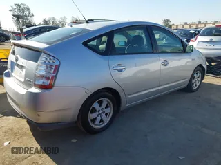 2007 Toyota Prius z VIN JTDKB20U477567380, wystawiony jako IAAI lot #42323632 z przebiegiem 193 349 mil mil oraz . Historia ofert i sprzedaży dostępna na DreamBid. Obrazek 4.