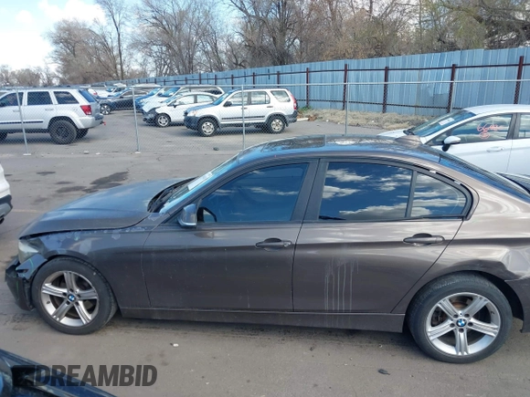2014 BMW 3 Series 320i xDrive with VIN WBA3C3C58EF983816, listed as a IAAI auction lot 41949430 with 111,627 mi miles. Bid and sale history available at carsss.com. Image 14.