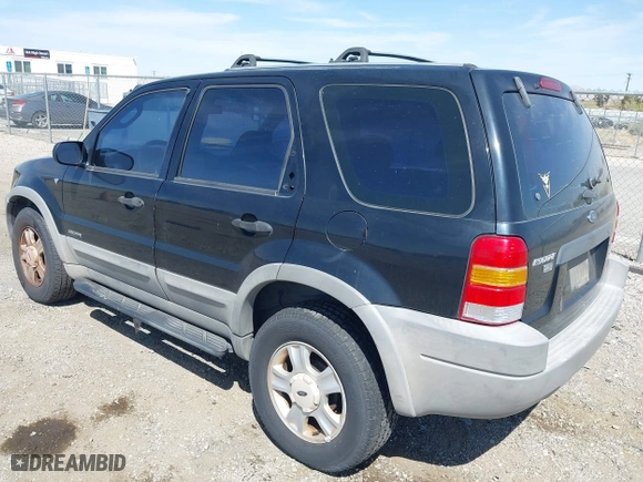 2001 Ford Escape XLT with VIN 1FMYU03141KF43980, listed as a IAAI auction lot 41989002 with 222,344 mi miles. Bid and sale history available at carsss.com. Image 3.