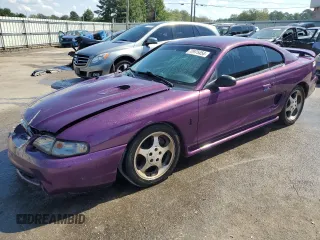 1997 Ford Mustang Cobra with VIN 1FALP47V0VF117976, listed as a Copart auction lot 72975454 with 165,076 mi miles and Salvage Title. Bid and sale history available at carsss.com. Image 1.