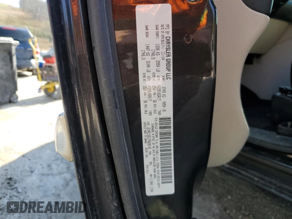 2015 Chrysler Town & Country Touring with VIN 2C4RC1BG1FR628145, listed as a Copart auction lot 50597435 with 115,177 mi miles and Salvage Title. Bid and sale history available at carsss.com. Image 16.