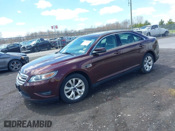 2012 Ford Taurus SEL with VIN 1FAHP2EW2CG140818, listed as a IAAI auction lot 42101815 with 55,323 mi miles and . Bid and sale history available at DreamBid. Image 2.