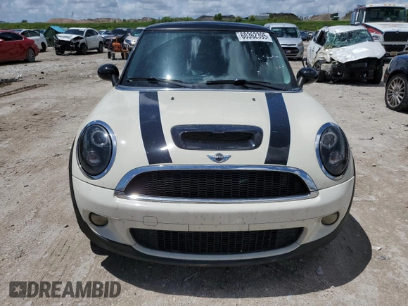 2009 MINI Hardtop S with VIN WMWMF73569TW87834, listed as a Copart auction lot 60362395 with 52,448 mi miles and Salvage title. Bid and sale history available at DreamBid. Image 5.