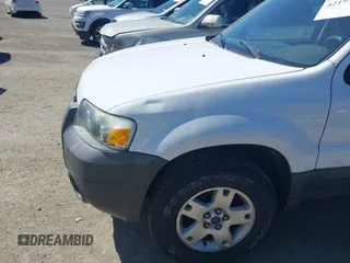 2007 Ford Escape XLT with VIN 1FMYU03127KC05177, listed as a IAAI auction lot 42199281 with 144,846 mi miles and . Bid and sale history available at DreamBid. Image 6.