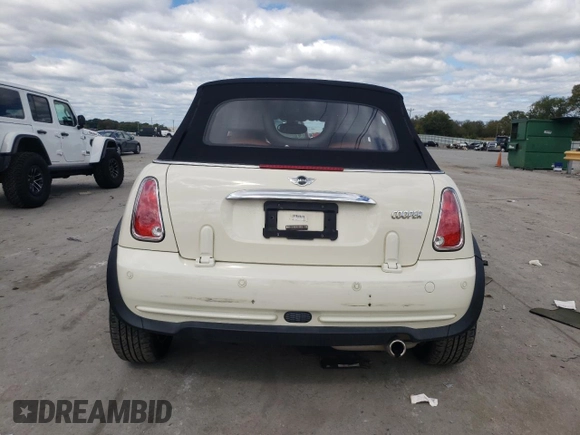 2008 MINI Convertible with VIN WMWRF33518TF67472, listed as a Copart auction lot 72073604 with 61,024 mi miles and Salvage title. Bid and sale history available at DreamBid. Image 6.