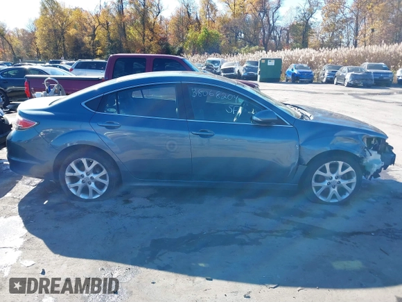 2013 Mazda 6 i Touring Plus z VIN 1YVHZ8EH8D5M15043, wystawiony jako IAAI lot #38068204 z przebiegiem 217 806 mil mil oraz . Historia ofert i sprzedaży dostępna na DreamBid. Obrazek 13.
