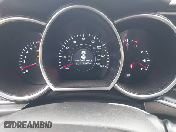 2014 Kia Optima LX with VIN 5XXGM4A73EG277964, listed as a IAAI auction lot 42079663 with 91,009 mi miles. Bid and sale history available at carsss.com. Image 7.