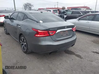 2016 Nissan Maxima SL with VIN 1N4AA6AP0GC424793, listed as a IAAI auction lot 40922109 with 135,974 mi miles and . Bid and sale history available at DreamBid. Image 3.