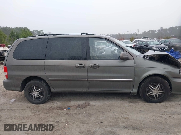 2005 Kia Sedona LX with VIN KNDUP132056674430, listed as a IAAI auction lot 41553321 with 136,734 mi miles. Bid and sale history available at carsss.com. Image 13.