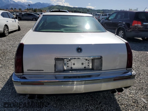 1994 Cadillac Eldorado ESC z VIN 1G6EL12Y6RU619510, wystawiony jako Copart lot #51524645 z przebiegiem 139 223 mil mil oraz Szkody całkowita. Historia ofert i sprzedaży dostępna na DreamBid. Obrazek 6.