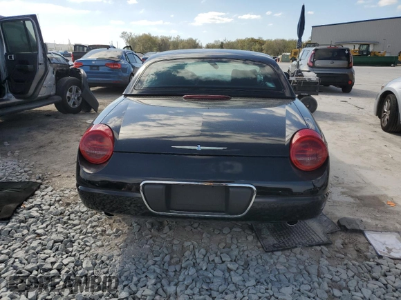 2004 Ford Thunderbird Deluxe z VIN 1FAHP60A74Y112611, wystawiony jako Copart lot #46393905 z przebiegiem 41 120 mil mil oraz Szkoda całkowita • Salvage title. Historia ofert i sprzedaży dostępna na DreamBid. Obrazek 6.
