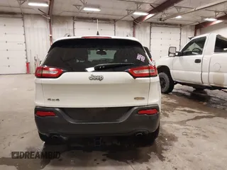 2014 Jeep Cherokee Latitude with VIN 1C4PJMCS4EW318353, listed as a IAAI auction lot 41945598 with 179,425 mi miles and . Bid and sale history available at DreamBid. Image 16.