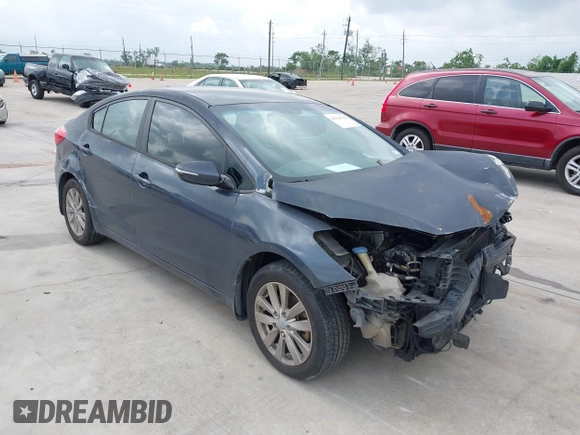2014 Kia Forte LX with VIN KNAFX4A68E5145665, listed as a IAAI auction lot 42129786 with 192,514 mi miles and . Bid and sale history available at DreamBid. Image 1.