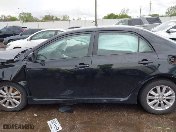 2010 Toyota Corolla with VIN 2T1BU4EEXAC458872, listed as a IAAI auction lot 41899479 with 169,513 mi miles. Bid and sale history available at carsss.com. Image 15.