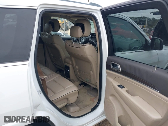2014 Jeep Grand Cherokee Overland with VIN 1C4RJECG4EC543092, listed as a IAAI auction lot 40981315 with 149,096 mi miles. Bid and sale history available at carsss.com. Image 8.