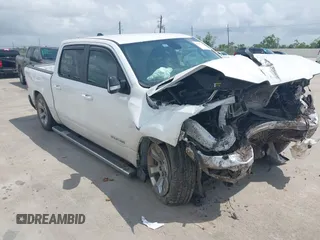 2022 Ram 1500 Lone Star with VIN 1C6RREFM1NN326038, listed as a IAAI auction lot 42097266 with Not provided miles and . Bid and sale history available at DreamBid. Image 1.