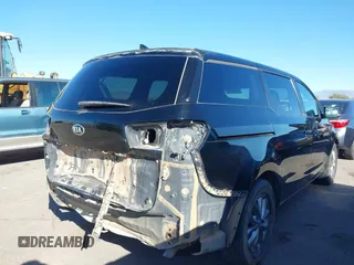 2020 Kia Sedona EX with VIN KNDMB5C11L6594029, listed as a IAAI auction lot 40951800 with 164,989 mi miles. Bid and sale history available at carsss.com. Image 4.