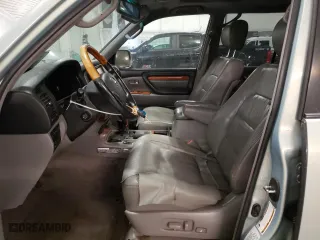 2004 Lexus LX 470 with VIN JTJHT00W843548361, listed as a Copart auction lot 76465204 with 257,543 mi miles and Salvage Title. Bid and sale history available at carsss.com. Image 7.