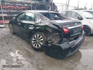 2016 Nissan Altima 2.5 SL with VIN 1N4AL3AP9GC211382, listed as a IAAI auction lot 40822233 with 154,789 mi miles. Bid and sale history available at carsss.com. Image 3.