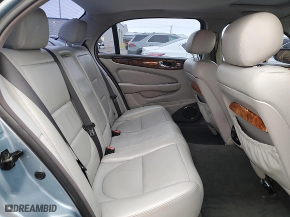 2005 Jaguar XJ with VIN SAJWA79CX5SG35319, listed as a Copart auction lot 49321465 with 182,834 mi miles and Salvage Title. Bid and sale history available at carsss.com. Image 10.