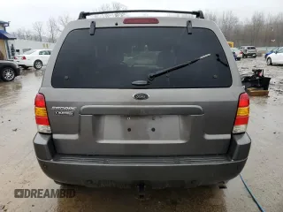 2003 Ford Escape Limited with VIN 1FMCU941X3KD47977, listed as a Copart auction lot 85054974 with 303,773 mi miles and Salvage Title. Bid and sale history available at carsss.com. Image 6.