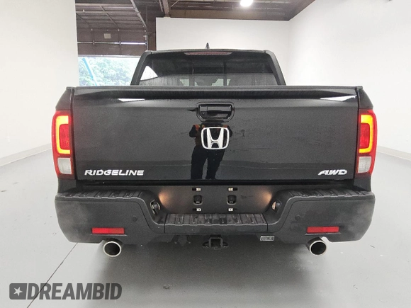 2023 Honda Ridgeline RTL-E with VIN 5FPYK3F79PB038896, listed as a Copart auction lot 58401225 with 23,531 mi miles and Clean title. Bid and sale history available at DreamBid. Image 6.