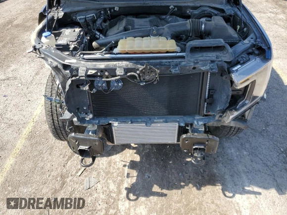 2018 Ford F-150 XL with VIN 1FTEW1EGXJKD26409, listed as a Copart auction lot 59403645 with 122,373 mi miles and Salvage title. Bid and sale history available at DreamBid. Image 11.