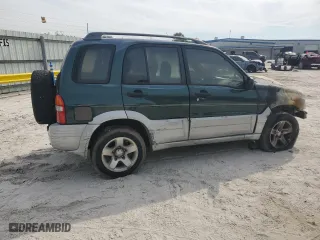 2000 Suzuki Grand Vitara JLX with VIN JS3TD62V5Y4113946, listed as a Copart auction lot 49154945 with 0 mi miles and Non Repairable. Bid and sale history available at carsss.com. Image 3.