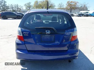 2009 Honda Fit with VIN JHMGE88249S056575, listed as a IAAI auction lot 41702555 with 116,658 mi miles. Bid and sale history available at carsss.com. Image 16.