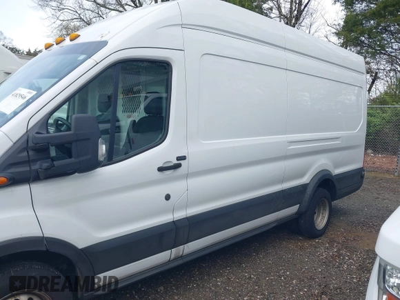 2019 Ford Transit Cargo with VIN 1FTBF4XG4KKB77787, listed as a IAAI auction lot 41829546 with 201,282 mi miles. Bid and sale history available at carsss.com. Image 14.