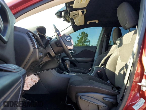 2015 Jeep Cherokee Latitude with VIN 1C4PJLCB5FW695592, listed as a Copart auction lot 50297695 with 108,091 mi miles and Salvage Title. Bid and sale history available at DreamBid. Image 7.
