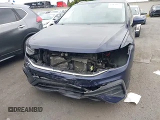 2022 Volkswagen Tiguan SE with VIN 3VV3B7AX0NM018659, listed as a IAAI auction lot 42076655 with 32,326 mi miles and . Bid and sale history available at DreamBid. Image 12.