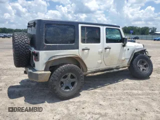 2015 Jeep Wrangler Unlimited Rubicon with VIN 1C4BJWFG6FL710993, listed as a Copart auction lot 62308195 with 103,938 mi miles and Salvage title. Bid and sale history available at DreamBid. Image 3.