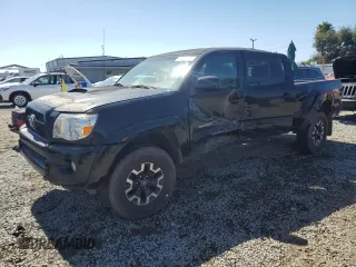 2011 Toyota Tacoma PreRunner with VIN 3TMKU4HNXBM030174, listed as a Copart auction lot 64105395 with 173,022 mi miles and Salvage title. Bid and sale history available at DreamBid. Image 1.