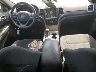 2016 Jeep Grand Cherokee Laredo with VIN 1C4RJFAG2GC328841, listed as a Copart auction lot 63553435 with 100,472 mi miles and Salvage title. Bid and sale history available at DreamBid. Image 8.
