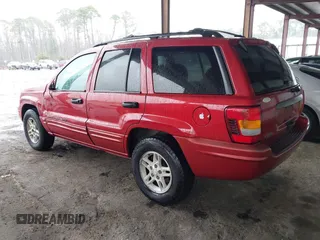 2004 Jeep Grand Cherokee z VIN 1J8GX48SX4C329289, wystawiony jako IAAI lot #41631610 z przebiegiem 212 362 mil mil oraz . Historia ofert i sprzedaży dostępna na DreamBid. Obrazek 3.