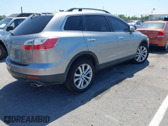 2012 Mazda CX-9 Grand Touring with VIN JM3TB2DA8C0362076, listed as a IAAI auction lot 42003392 with 125,927 mi miles. Bid and sale history available at carsss.com. Image 4.