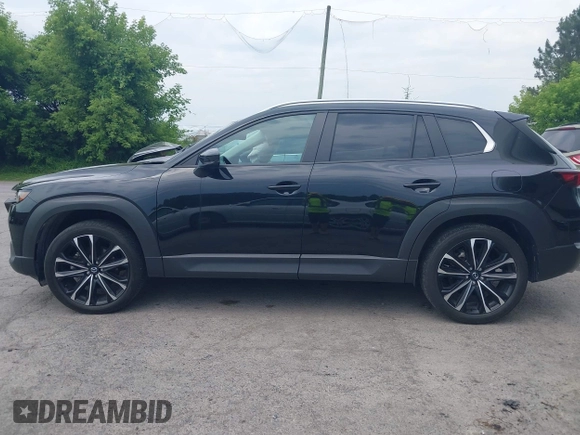 2023 Mazda CX-50 Meridian Edition with VIN 7MMVABXY1PN145913, listed as a IAAI auction lot 42632620 with 23,444 mi miles and . Bid and sale history available at DreamBid. Image 14.