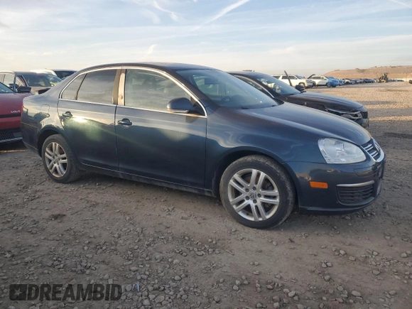 2007 Volkswagen Jetta z VIN 3VWDG71K27M010409, wystawiony jako Copart lot #84155424 z przebiegiem 140 665 mil mil oraz Czysty tytuł • Clean title. Historia ofert i sprzedaży dostępna na DreamBid. Obrazek 4.