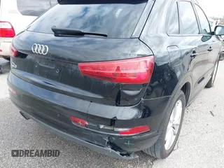 2018 Audi Q3 Premium z VIN WA1BCCFS8JR013032, wystawiony jako IAAI lot #41706173 z przebiegiem 111 402 mil mil oraz . Historia ofert i sprzedaży dostępna na DreamBid. Obrazek 6.