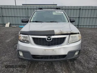2011 Mazda Tribute Touring with VIN 4F2CY0C71BKM06441, listed as a Copart auction lot 82831764 with 226,888 mi miles and Clean Title. Bid and sale history available at carsss.com. Image 5.