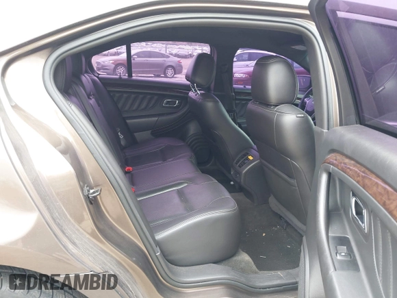 2015 Ford Taurus Limited with VIN 1FAHP2J84FG110702, listed as a IAAI auction lot 42060437 with 208,012 mi miles. Bid and sale history available at carsss.com. Image 8.