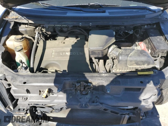 2013 Lincoln MKX z VIN 2LMDJ6JK2DBL03061, wystawiony jako Copart lot #49596545 z przebiegiem 183 933 mil mil oraz Szkoda całkowita • Salvage title. Historia ofert i sprzedaży dostępna na DreamBid. Obrazek 11.