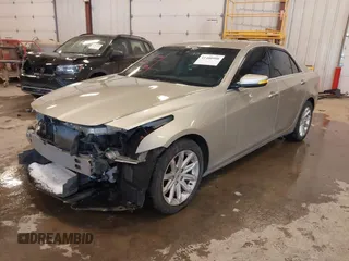 2014 Cadillac CTS Luxury AWD with VIN 1G6AX5S3XE0197628, listed as a IAAI auction lot 41400988 with 144,026 mi miles and . Bid and sale history available at DreamBid. Image 2.