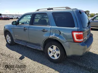 2011 Ford Escape Hybrid z VIN 1FMCU4K34BKC63661, wystawiony jako Copart lot #50991195 z przebiegiem 109 791 mil mil oraz Szkoda całkowita • Salvage title. Historia ofert i sprzedaży dostępna na DreamBid. Obrazek 2.