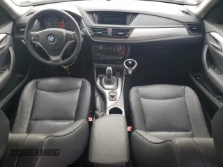 2015 BMW X1 xDrive28i with VIN WBAVL1C58FVY39591, listed as a Copart auction lot 73548684 with 152,569 mi miles and Salvage Title. Bid and sale history available at carsss.com. Image 8.