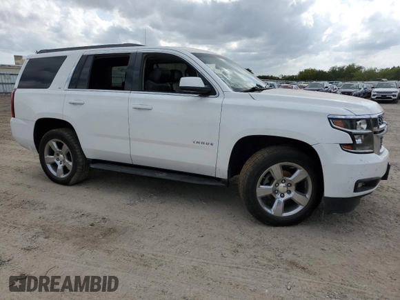 2015 Chevrolet Tahoe LT with VIN 1GNSCBKC6FR613948, listed as a Copart auction lot 53536465 with 141,852 mi miles and Salvage title. Bid and sale history available at DreamBid. Image 4.