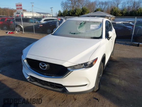 2017 Mazda CX-5 Touring with VIN JM3KFBCL8H0136601, listed as a IAAI auction lot 41830355 with 113,677 mi miles. Bid and sale history available at carsss.com. Image 18.